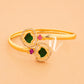 gold plated adjustable bangle with white stone