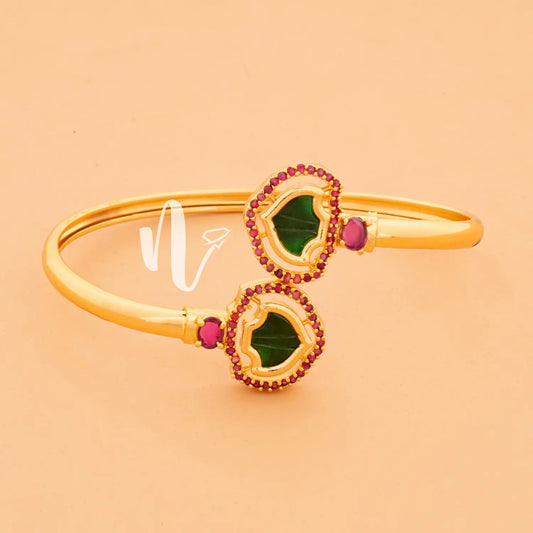 gold plated palakka bangle with pink stone