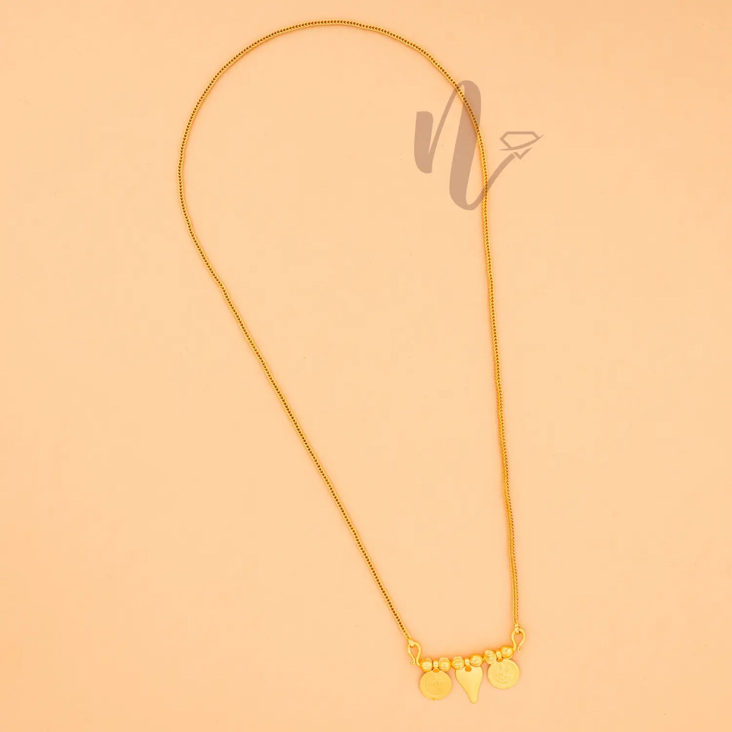 gold plated traditional coin thali 