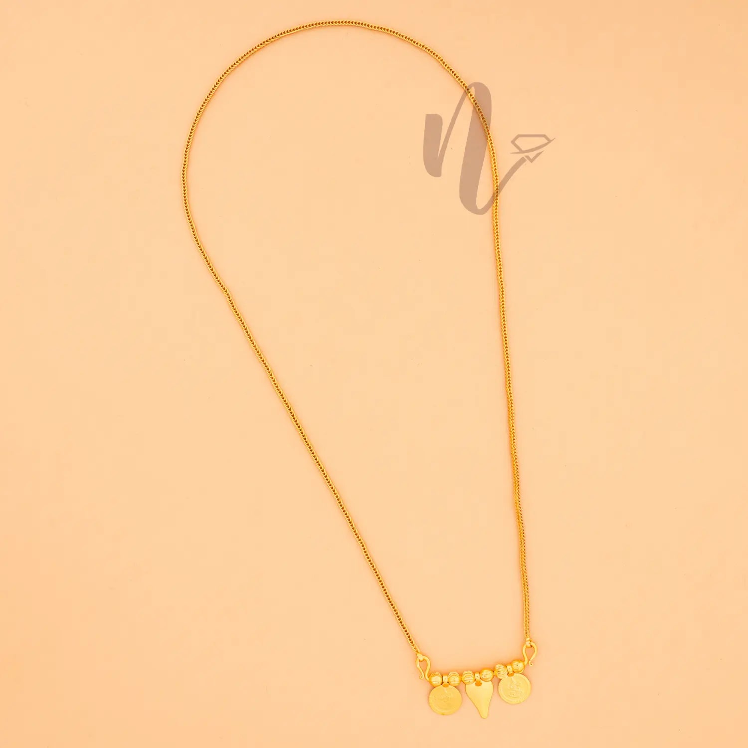 gold plated traditional coin thali 